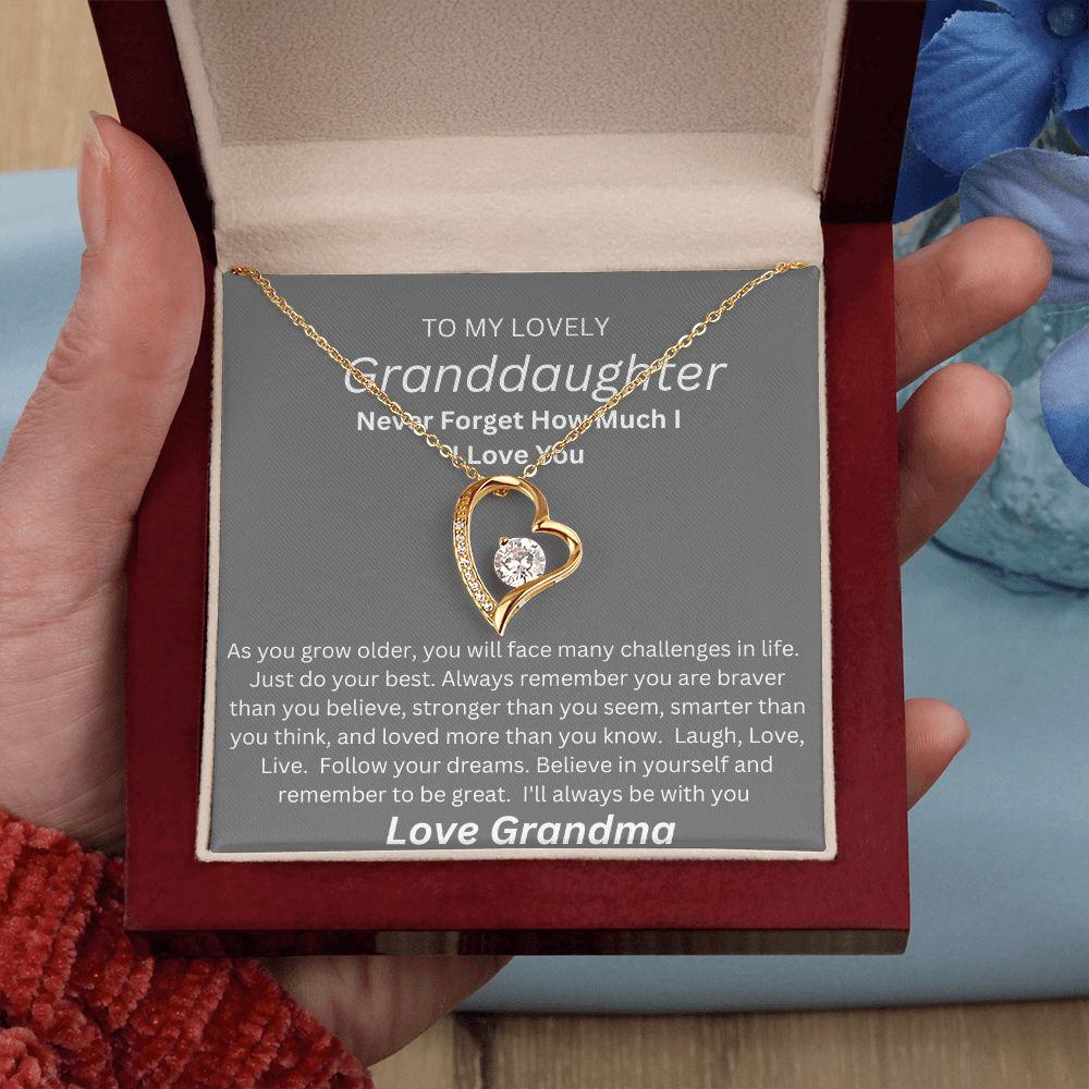 TO MY LOVEL GRANDDAUGHTER. HEART NECKLACE. LOVE GRANDMA