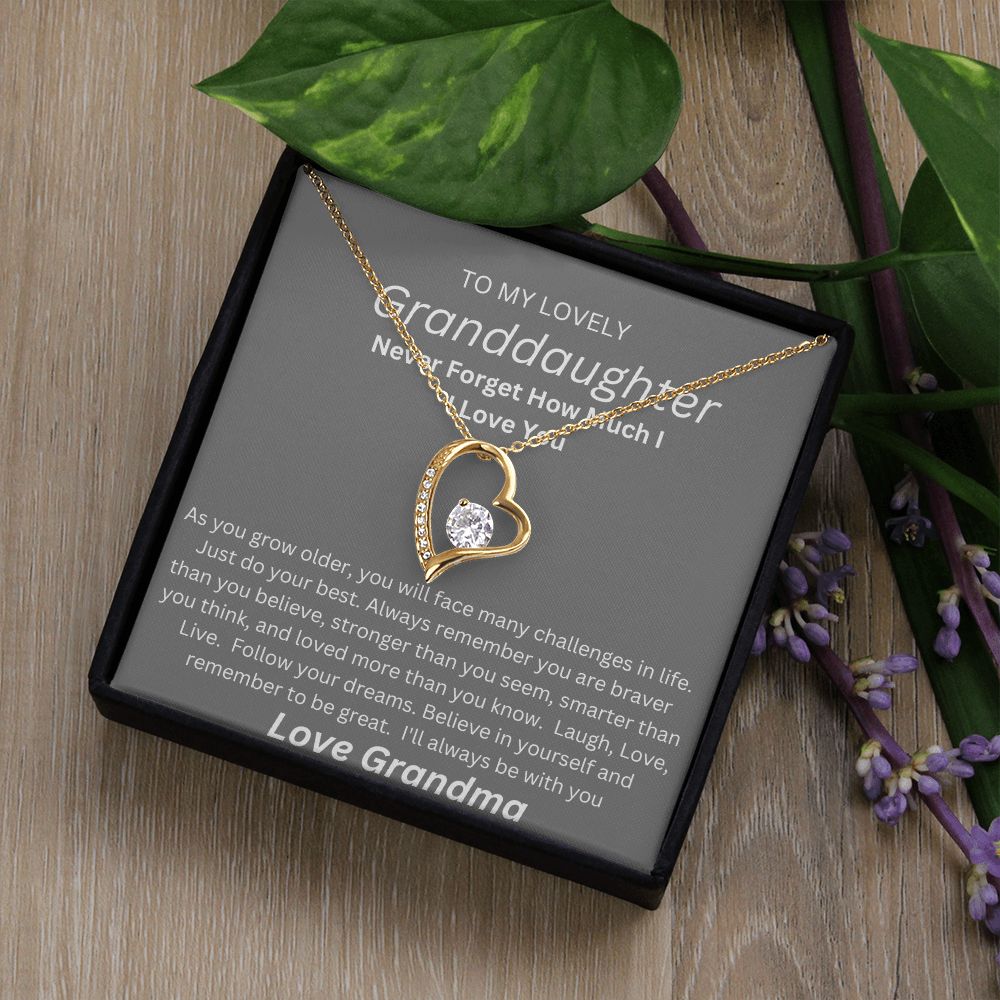 TO MY LOVEL GRANDDAUGHTER. HEART NECKLACE. LOVE GRANDMA