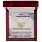 TO MY GRANDDAUGHTER INTERLOCKING HEART NECKLACE.